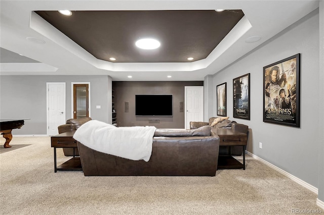 carpeted living room featuring baseboards, pool table, a tray ceiling, and recessed lighting