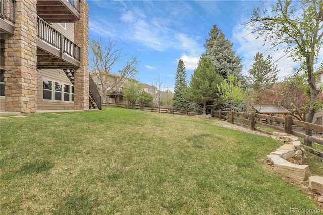 view of yard featuring fence