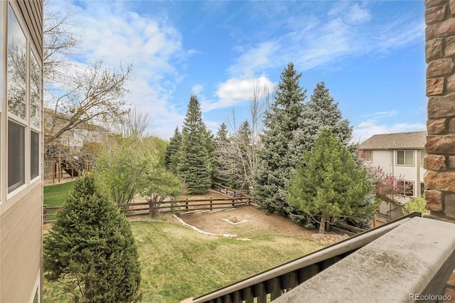 view of yard featuring fence