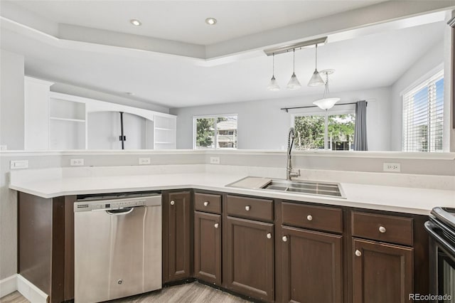 2125 E 103rd Ave, Thornton, CO 80229 - kitchen featuring dishwasher, dark brown cabinets, plenty of natural light, and recessed lighting
