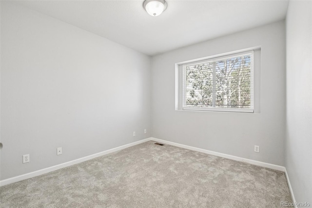 2125 E 103rd Ave, Thornton, CO 80229 - carpeted spare room featuring baseboards