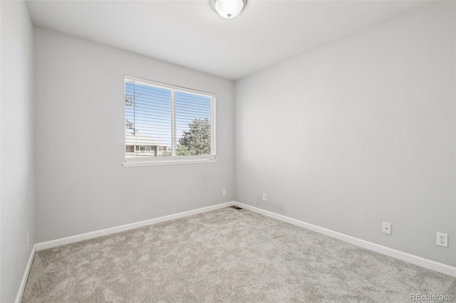 2125 E 103rd Ave, Thornton, CO 80229 - carpeted spare room featuring baseboards