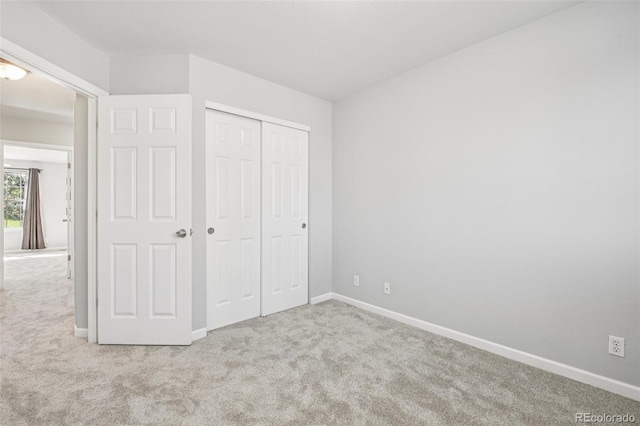 2125 E 103rd Ave, Thornton, CO 80229 - unfurnished bedroom featuring carpet floors and a closet