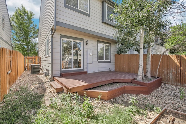 2125 E 103rd Ave, Thornton, CO 80229 - back of house with a fenced backyard and a wooden deck
