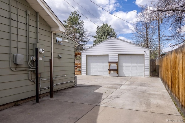 detached garage with fence