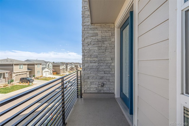balcony featuring a residential view