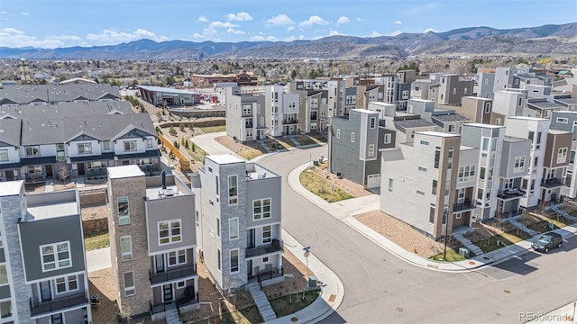 aerial view with a mountain view and a residential view