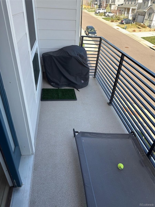 balcony featuring grilling area and a residential view