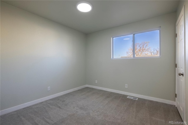 empty room featuring carpet floors