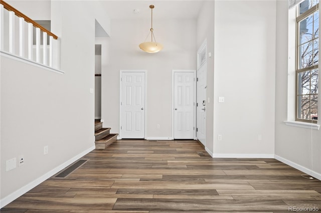 entrance foyer featuring a high ceiling