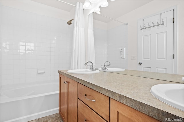 bathroom with shower / tub combo with curtain and vanity