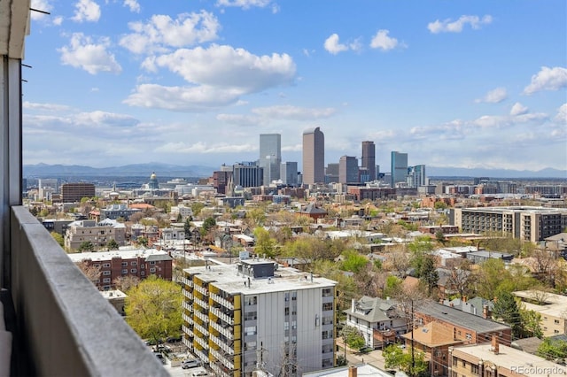 property's view of city with a mountain view