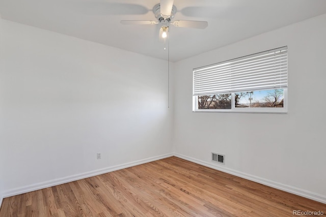 unfurnished room with ceiling fan and light hardwood / wood-style flooring