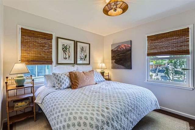 bedroom featuring baseboards