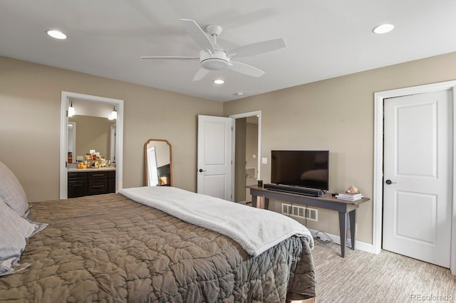 bedroom featuring ensuite bathroom and ceiling fan