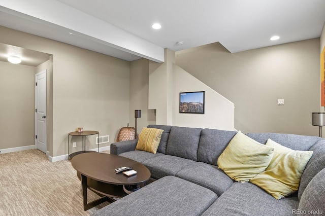 living room featuring light carpet