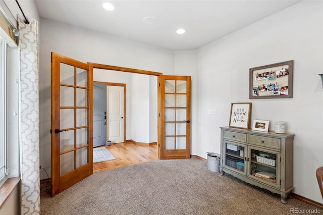 641 Denali Ct, Windsor, CO 80550 - carpeted spare room featuring french doors, recessed lighting, and baseboards