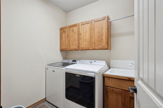641 Denali Ct, Windsor, CO 80550 - laundry room with cabinet space and washing machine and clothes dryer
