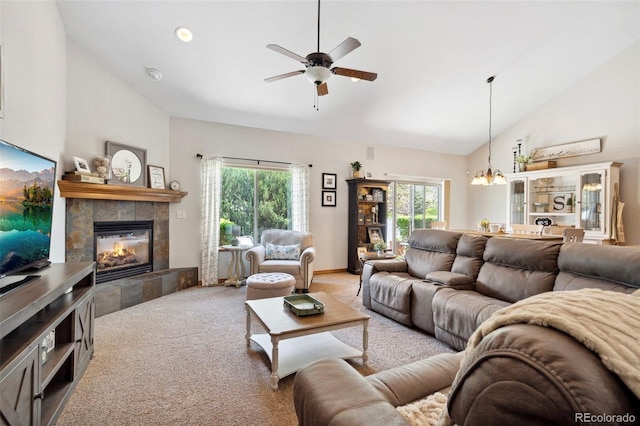 641 Denali Ct, Windsor, CO 80550 - living area featuring high vaulted ceiling, carpet floors, plenty of natural light, a fireplace, and a ceiling fan