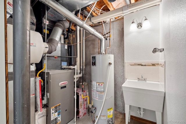 641 Denali Ct, Windsor, CO 80550 - utility room with gas water heater and a sink