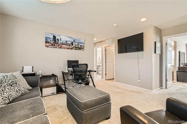 living room featuring light colored carpet