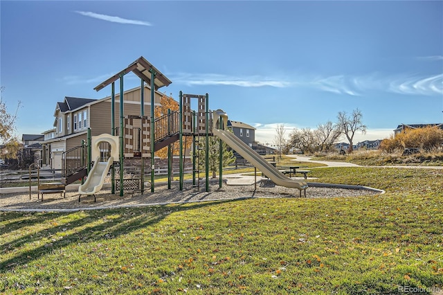 view of play area featuring a lawn