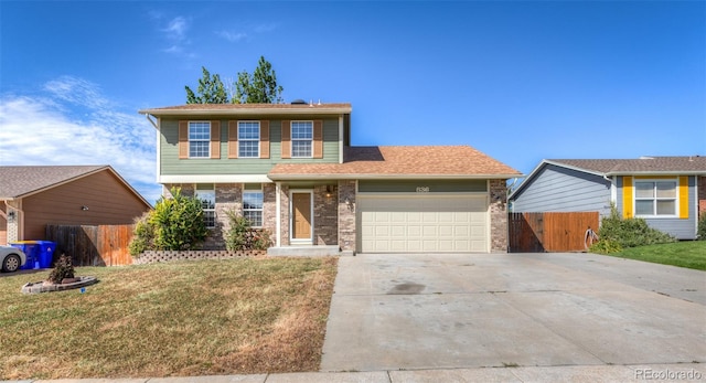 view of front facade featuring a garage and a front yard