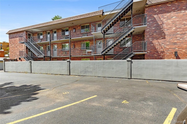 529 N Washington St Unit 304, Denver, CO 80203 - view of building exterior featuring uncovered parking