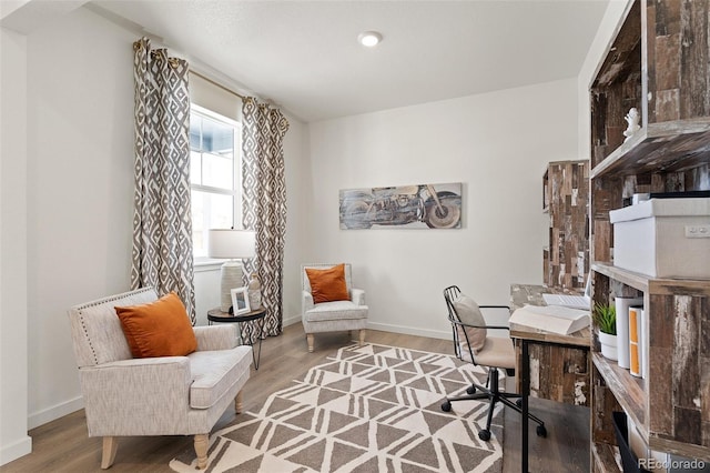 office with wood finished floors and baseboards