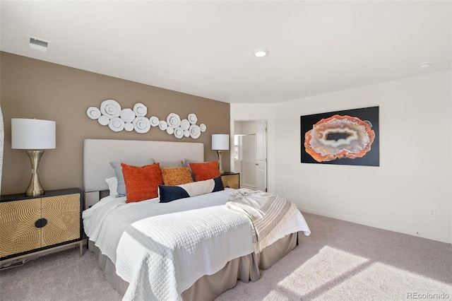 bedroom with carpet and baseboards