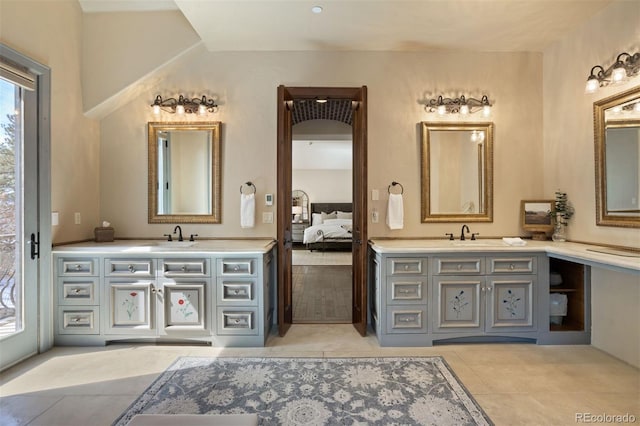 bathroom with vanity and tile patterned floors