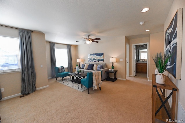 bedroom with recessed lighting, light colored carpet, visible vents, and baseboards