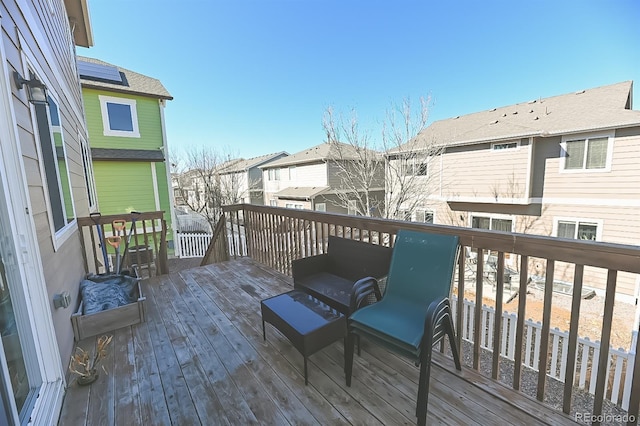 wooden deck with a residential view