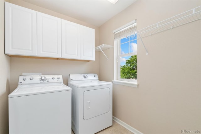 3565 E 141st Dr, Thornton, CO 80602 - laundry area with cabinet space, independent washer and dryer, and baseboards