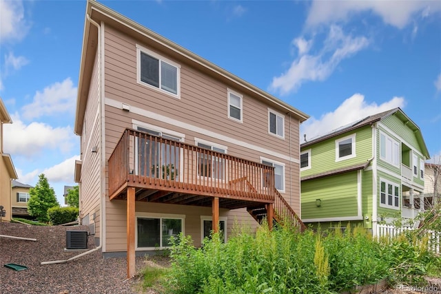 3565 E 141st Dr, Thornton, CO 80602 - back of house featuring a deck, central AC, and stairs