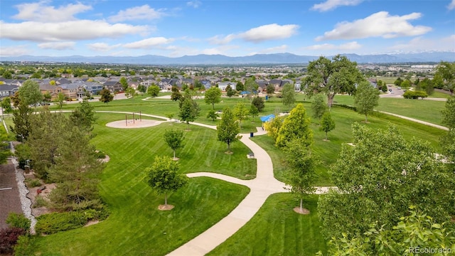 3565 E 141st Dr, Thornton, CO 80602 - aerial view of property and surrounding area featuring nearby suburban area and a mountain backdrop