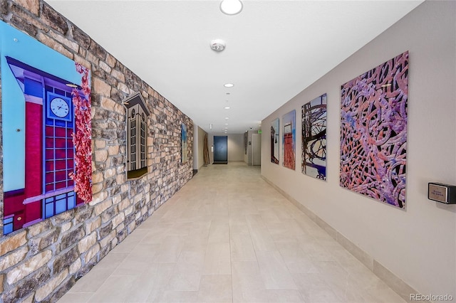 hallway with recessed lighting