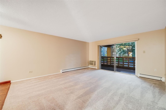 unfurnished room featuring carpet floors, an AC wall unit, and a baseboard radiator