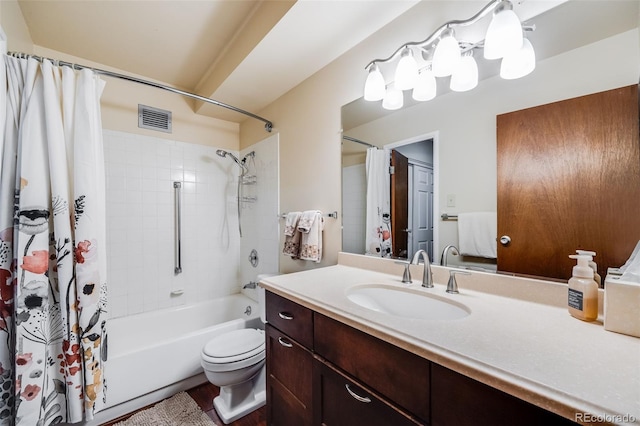 full bathroom with shower / bath combination with curtain, vanity, and toilet