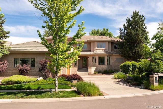 2535 W 115th Dr, Westminster, CO 80234 - view of front of property featuring driveway, stucco siding, and brick siding