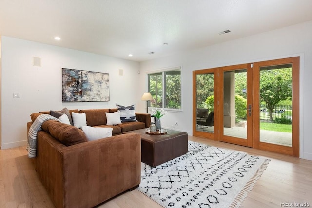 2535 W 115th Dr, Westminster, CO 80234 - living area with light wood-style floors, recessed lighting, and baseboards