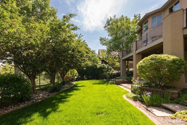 2535 W 115th Dr, Westminster, CO 80234 - view of green lawn with a balcony