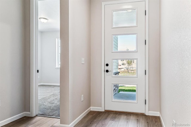 doorway featuring light hardwood / wood-style floors