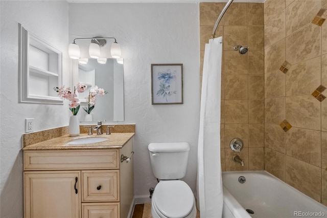 bathroom with toilet, shower / bath combination with curtain, and vanity