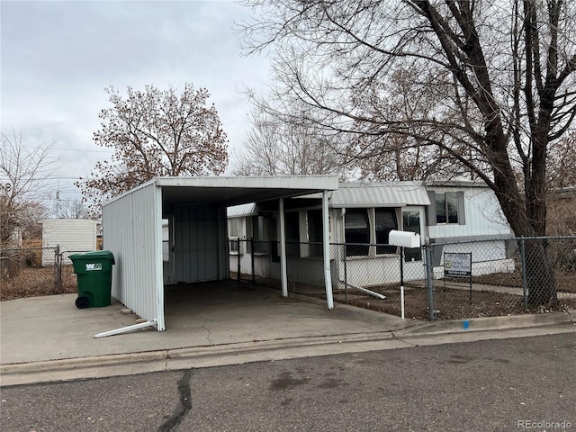 view of front of house with a carport