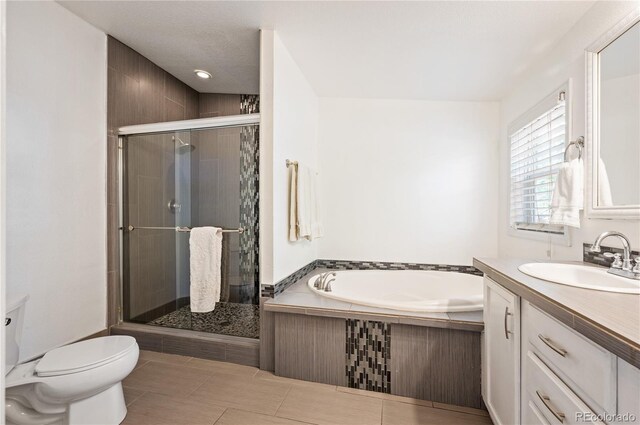 1522 Willow St, Denver, CO 80220 - full bathroom featuring a bath, vanity, a shower stall, and toilet