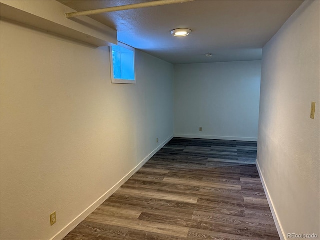 1906 Larkspur Dr, Fort Collins, CO 80521 - basement with baseboards and dark wood finished floors