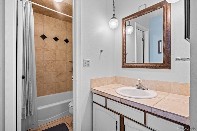 bathroom featuring tile patterned flooring, shower / bathtub combination with curtain, toilet, and vanity