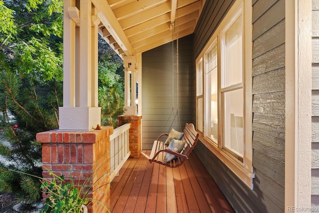 wooden deck featuring a porch