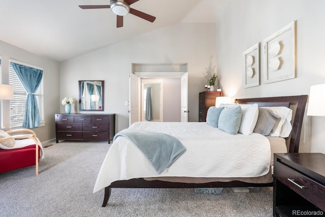 bedroom featuring lofted ceiling, ceiling fan, and light colored carpet